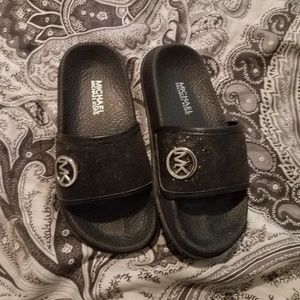 Micheal Kors black glittery slip-on slides